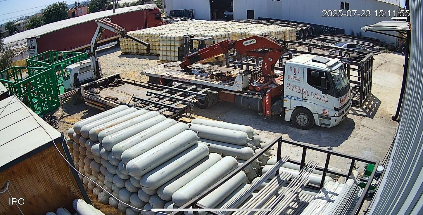 Aerial view of CNG MEGC manufacturing facility with cylinders, assembly equipment, and production areas