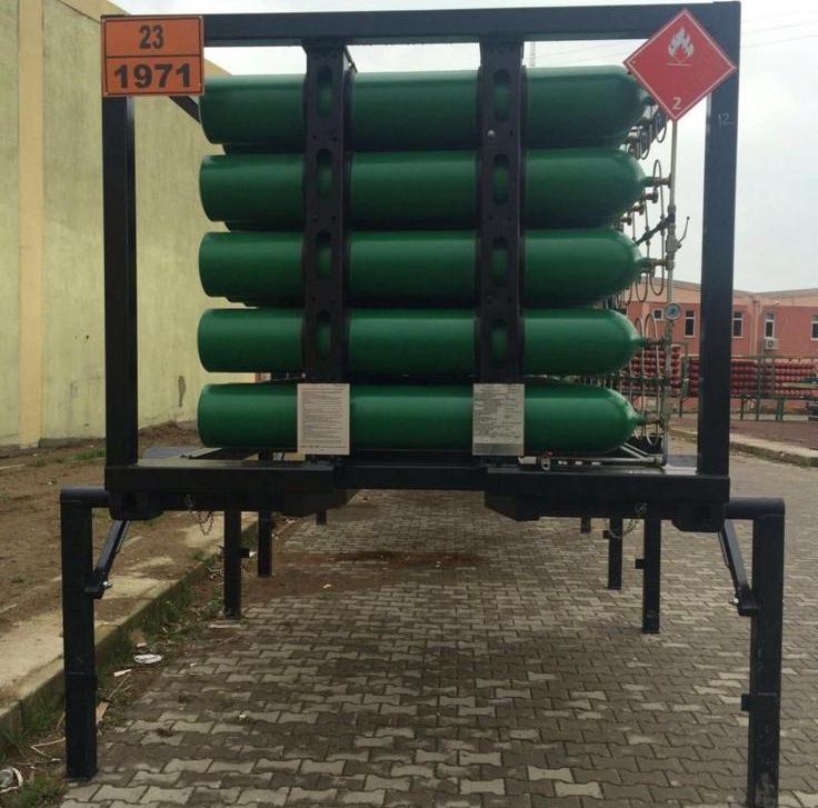 Green CNG cylinders in black frame with UN 1971 hazard placards
