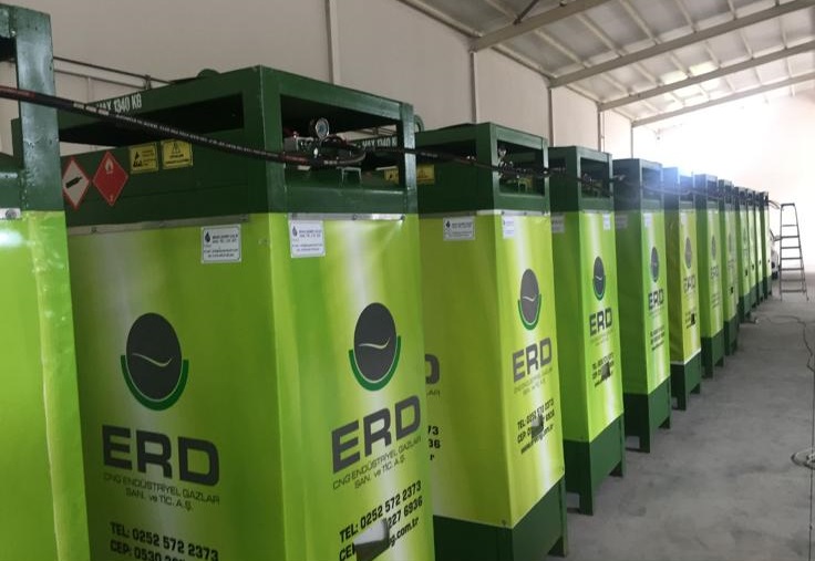 Indoor warehouse view of ERD branded green CNG dispensers