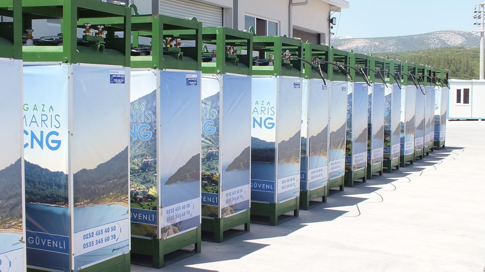 GAZI ARIS CNG dispensers with scenic mountain lake branding