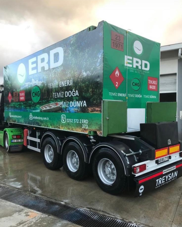 ERD branded green trailer with nature graphics and clean energy messaging